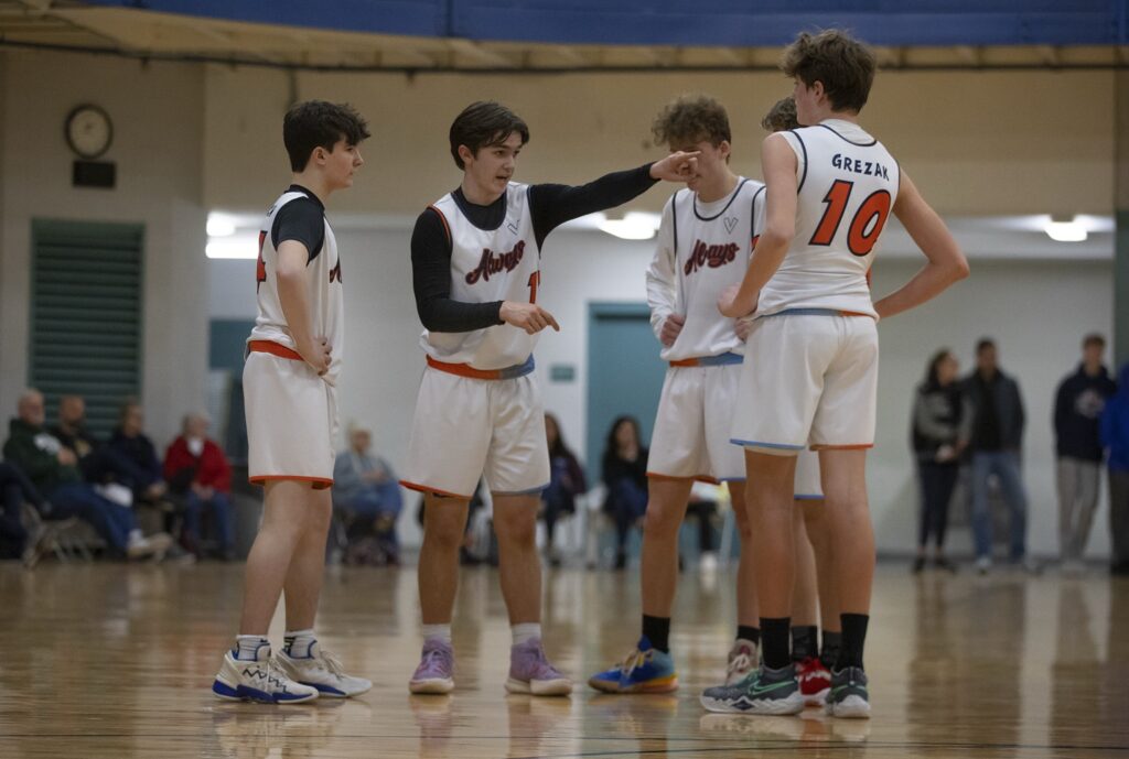 Always Basketball boys working together during a basketball game