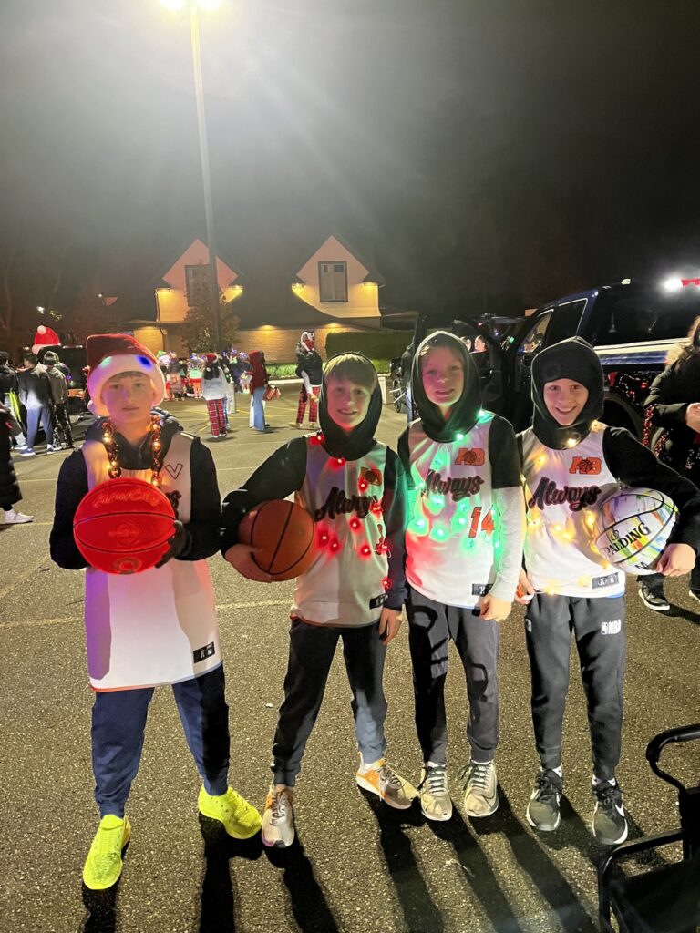Always Basketball boys participating in the Northville Lighted Parade