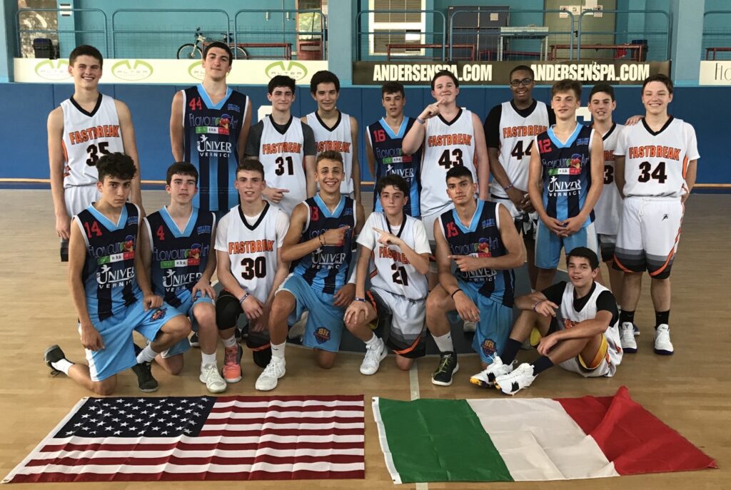 American and Italian youth basketball players together during a basketball experience in Italy
