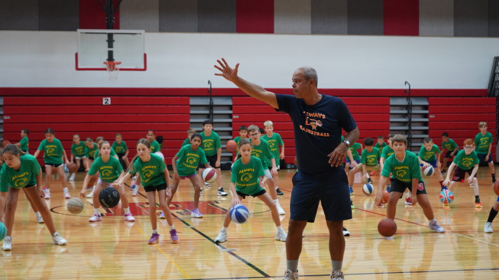 Always Basketball youth summer camp with boys and girls practicing basketball skills in Northville, Michigan